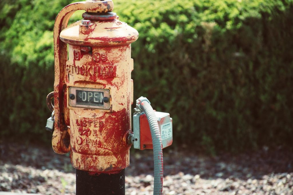red and beige metal pipe